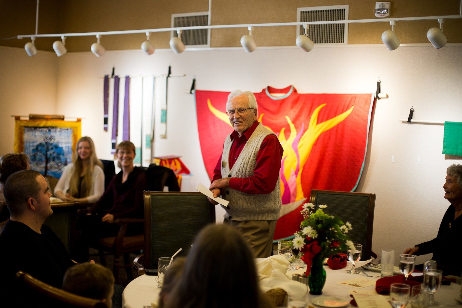 Speaker addressing guests at a corporate event